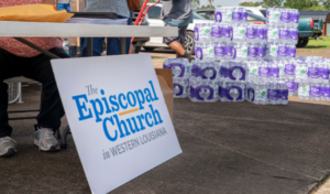 The Episcopal Church in Western Louisiana hands out bottled water and gift cards to the local grocery store to local residents still affected by last year’s Hurricane Laura and Hurricane Delta at Evergreen Missionary Baptist Church in DeQuincy, Louisiana on July 17, 2021.