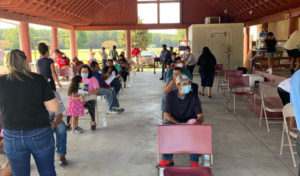 Members of migrant worker community attend an Episcopal Farmworker Ministry COVID-19 vaccination event