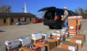 A church distributing nonperishable goods amid the COVID-19 pandemic.