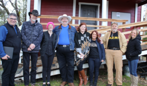 Episcopal Relief & Development staff member Lura Steele, Episcopal Diocese of Northern California staff members, West Slope Foundation staff members and Grizzly community members stand in front of the tool shed. Photo: Courtney Moore