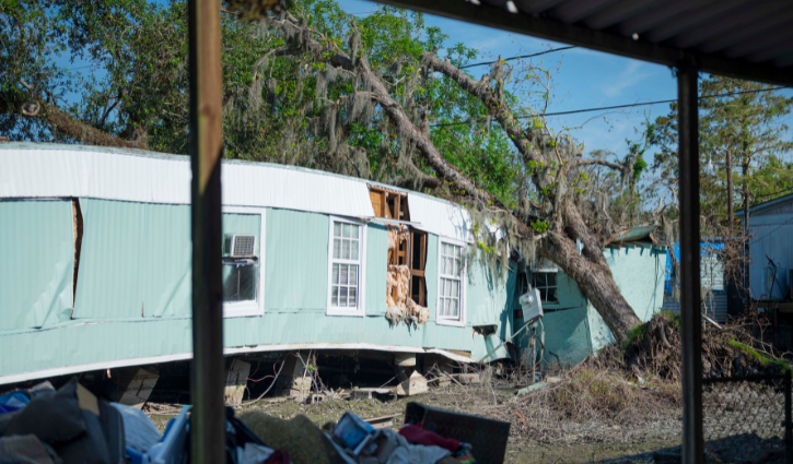 Damage to a home in Louisiana after Hurricane Ida. Katie Sikora Photography. December, 2021.
