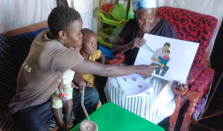Phelix describing what he can see during the FAMA at home visit session.