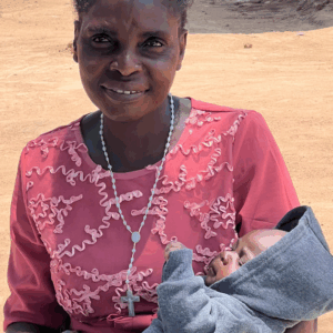 A grandmother caring for her grandson in Zambia.