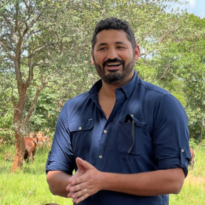 Matt Silva speaking to fellow board members, local partners, and community members during his 2025 trip to Zambia.