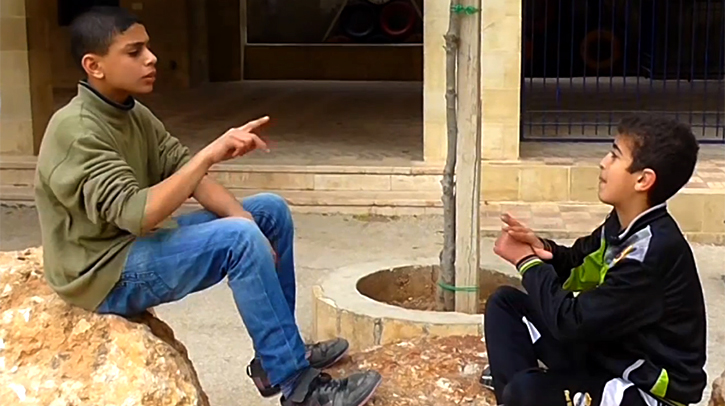 Boys Communicating with Sign Language at Za'atari Disability Center